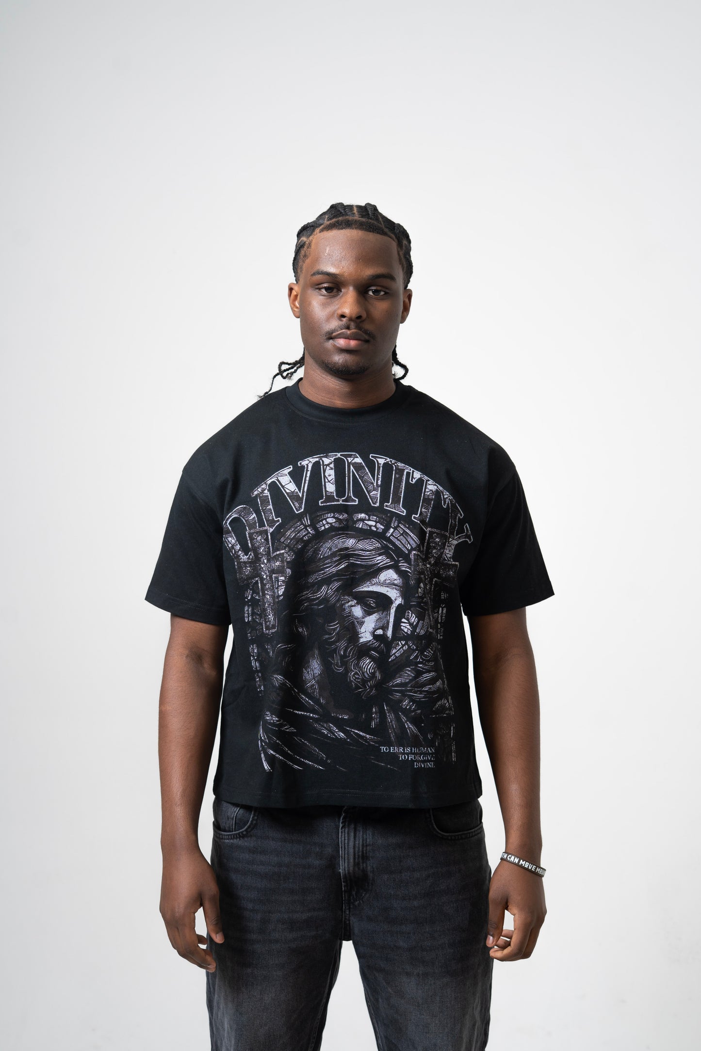 Model wearing Divinity Crop Tee with DTG print, showcasing 260 GSM 100% cotton fabric in black color.